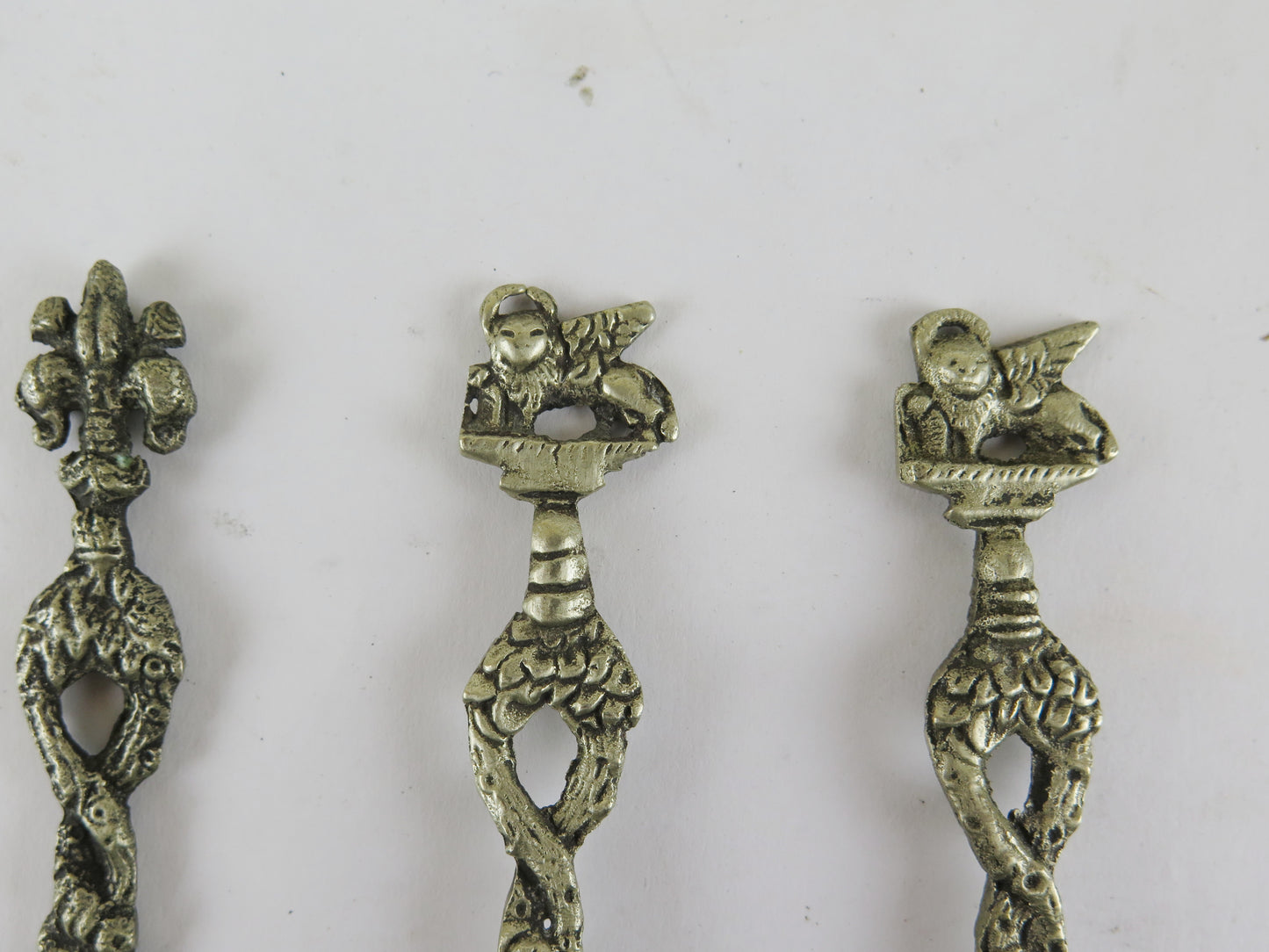 7 antique teaspoons venice lion san marco and one lily of florence vs8