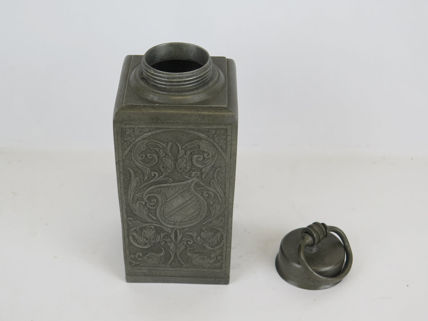 Antique pewter decanter bottle with relief decoration Germany 1890 1900 marked on the bottom with screw cap VA6