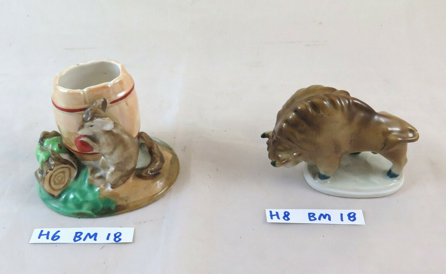 TWO PORCELAIN FIGURINES OF WHICH ONE ZSOLNAY BISON AND ANOTHER GR MOUSE MICKEY MOUSE BM18 