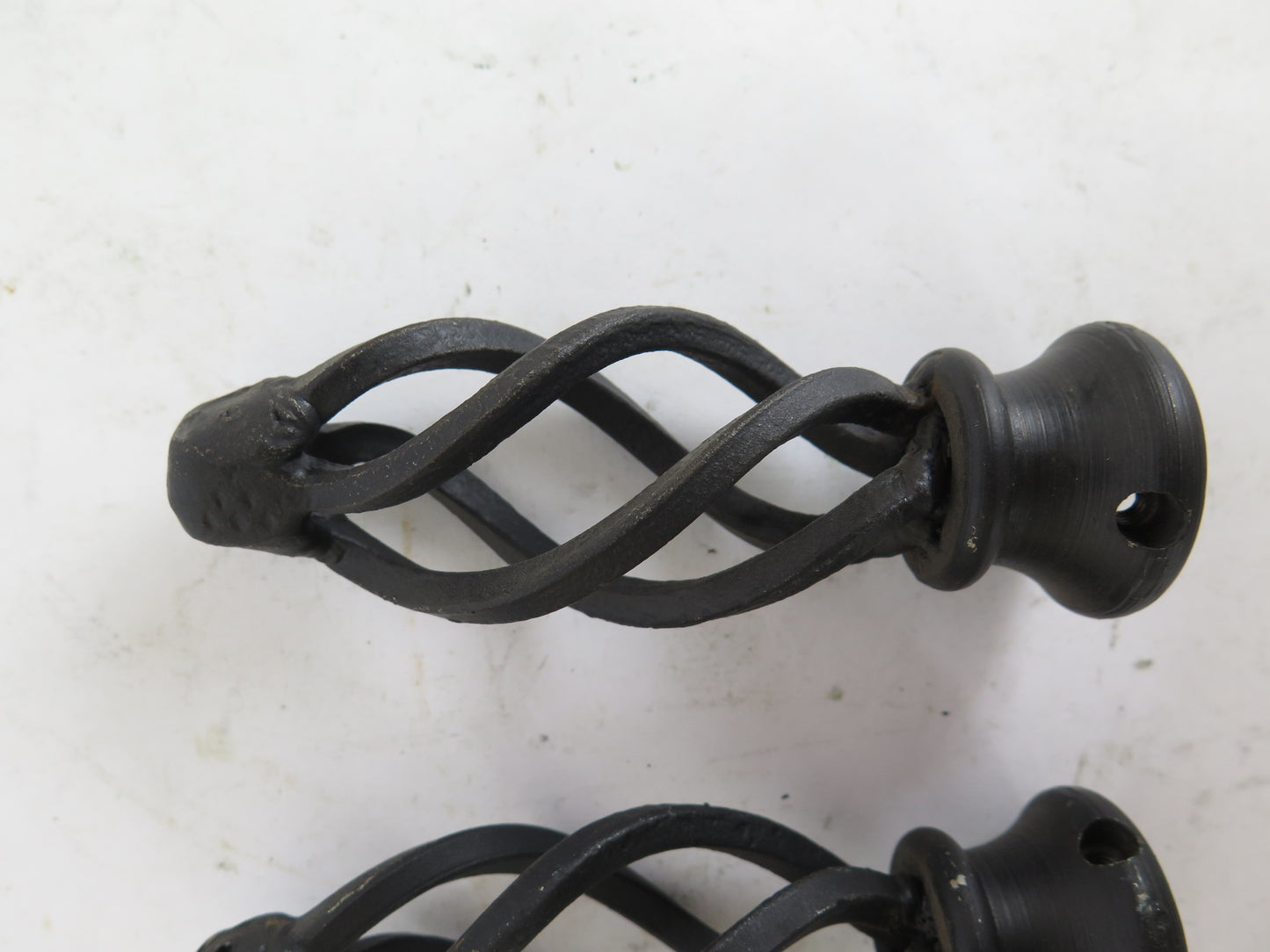 PAIR OF VINTAGE HANDMADE WROUGHT IRON CURTAIN ROD POINTS CH16