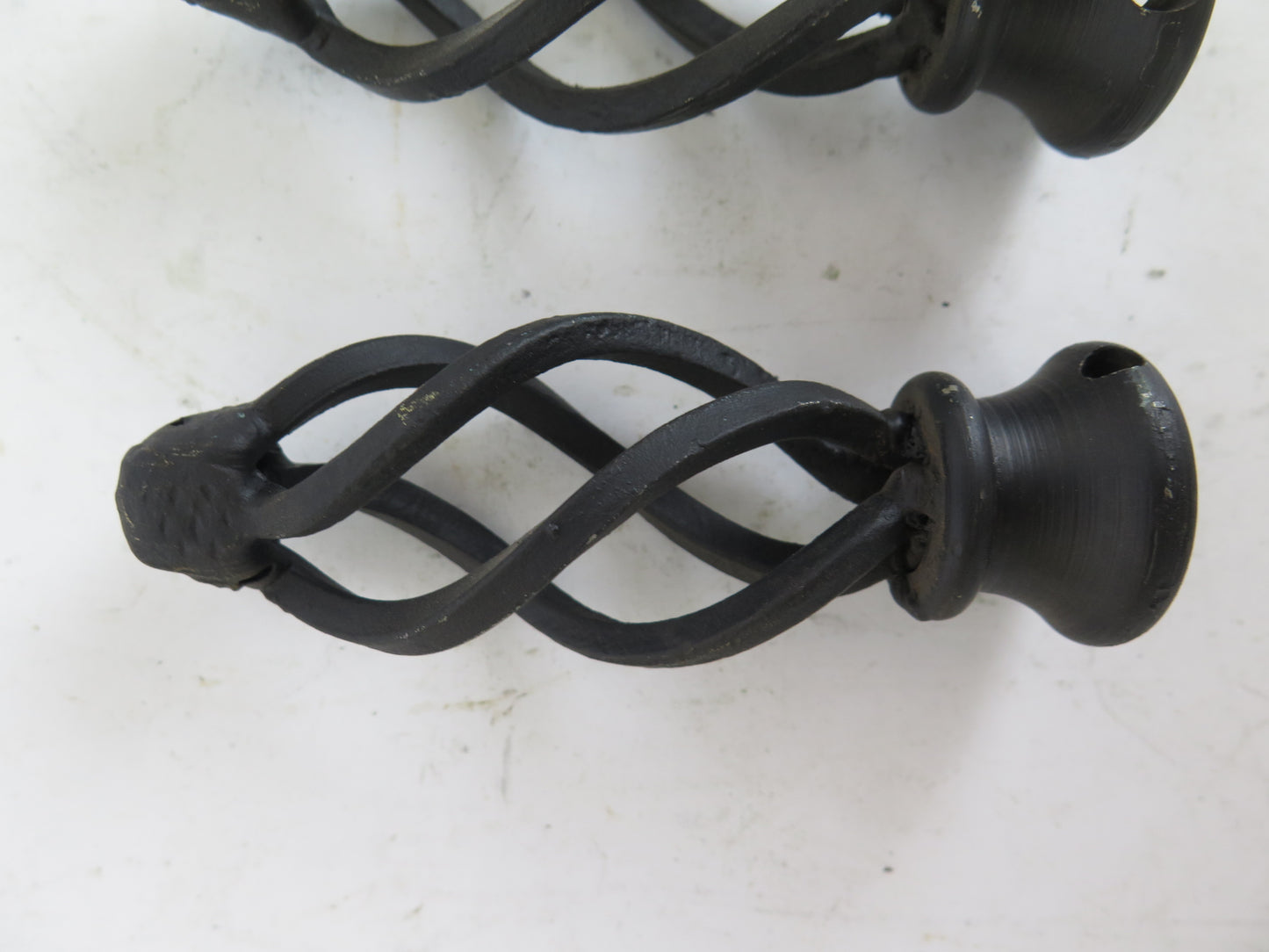 PAIR OF VINTAGE HANDMADE WROUGHT IRON CURTAIN ROD POINTS CH16