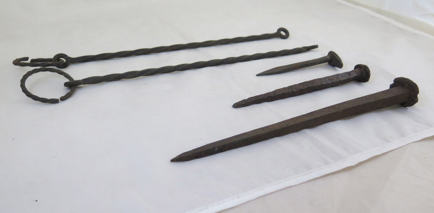 THREE LARGE WROUGHT IRON NAILS WITH TWO RODS FOR HANGING OBJECTS CH3