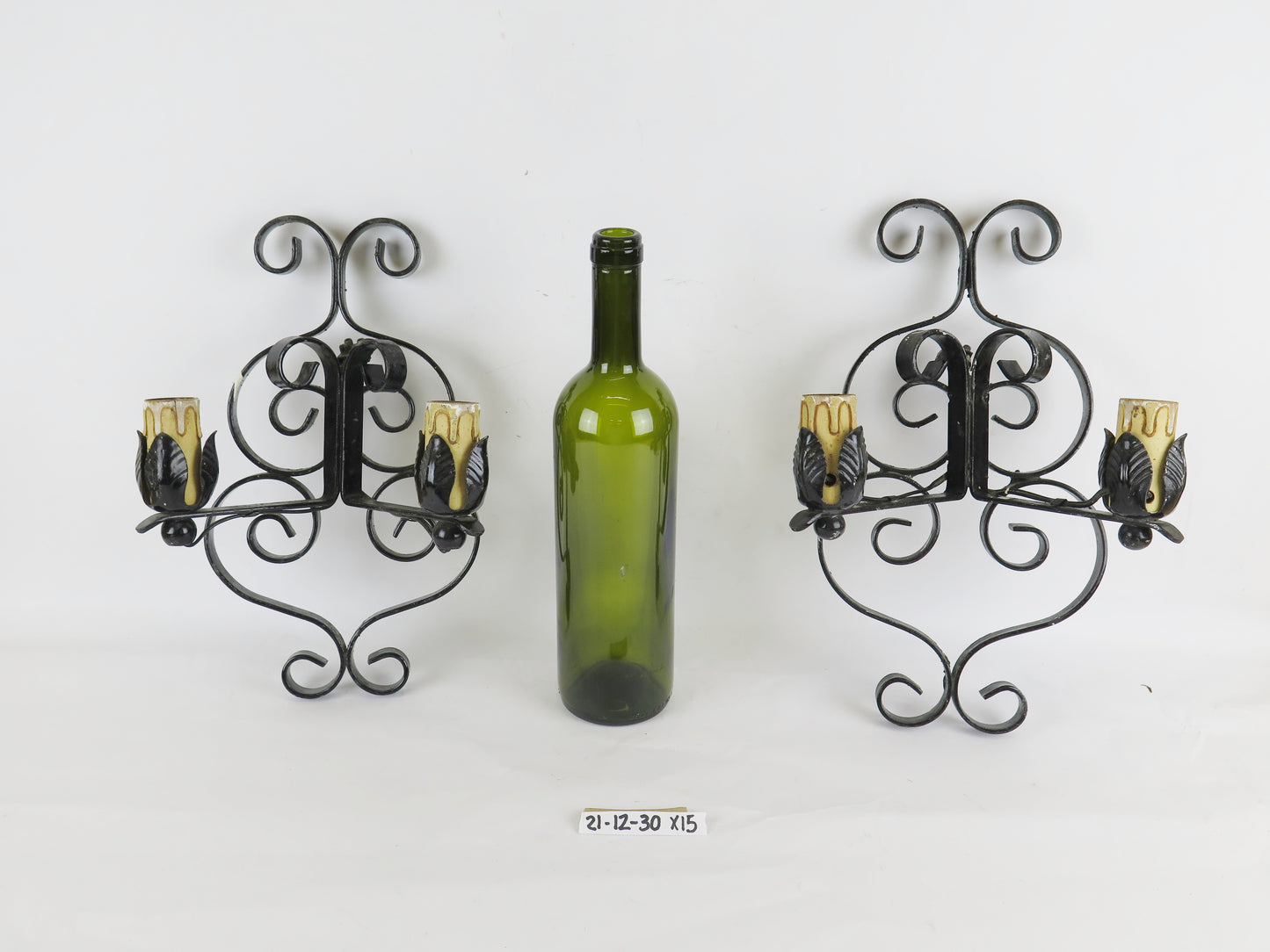 PAIR OF WROUGHT IRON APPLIQUES WITH TWO FLAMES DECORATED WITH VOLUTE PATTERNS X15